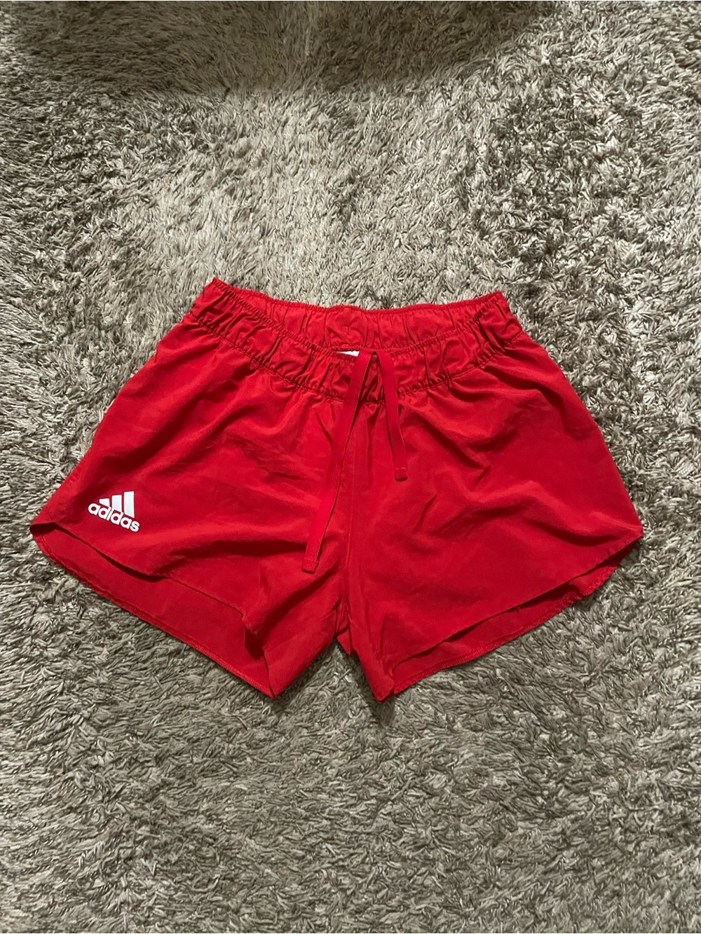 Red Adidas shorts, size medium